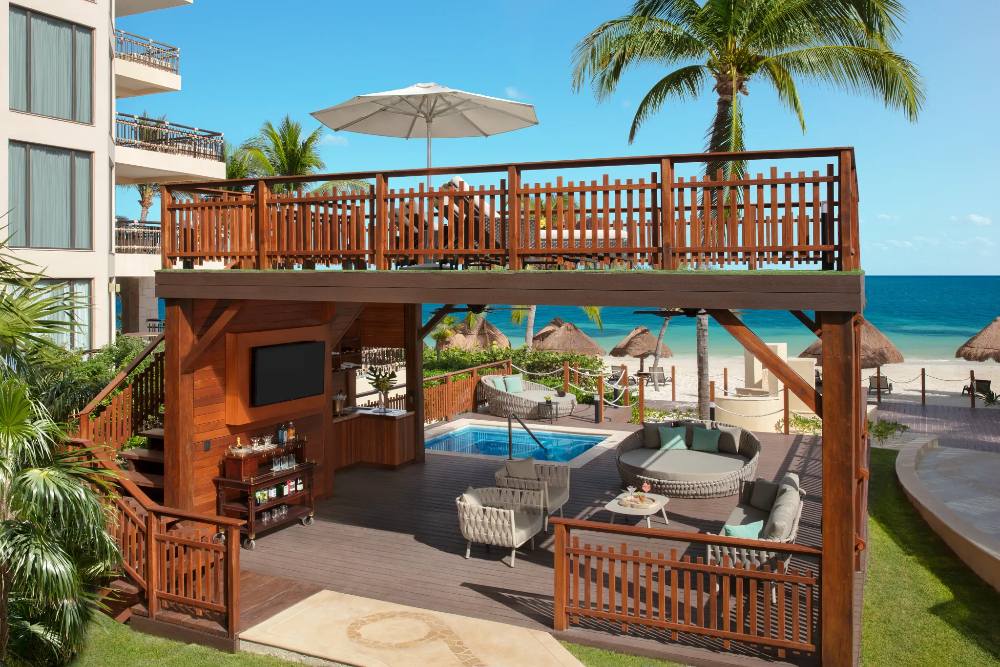 Private beachfront cabana deck with plunge pool and ocean views at Dreams Riviera Cancun Resort & Spa.