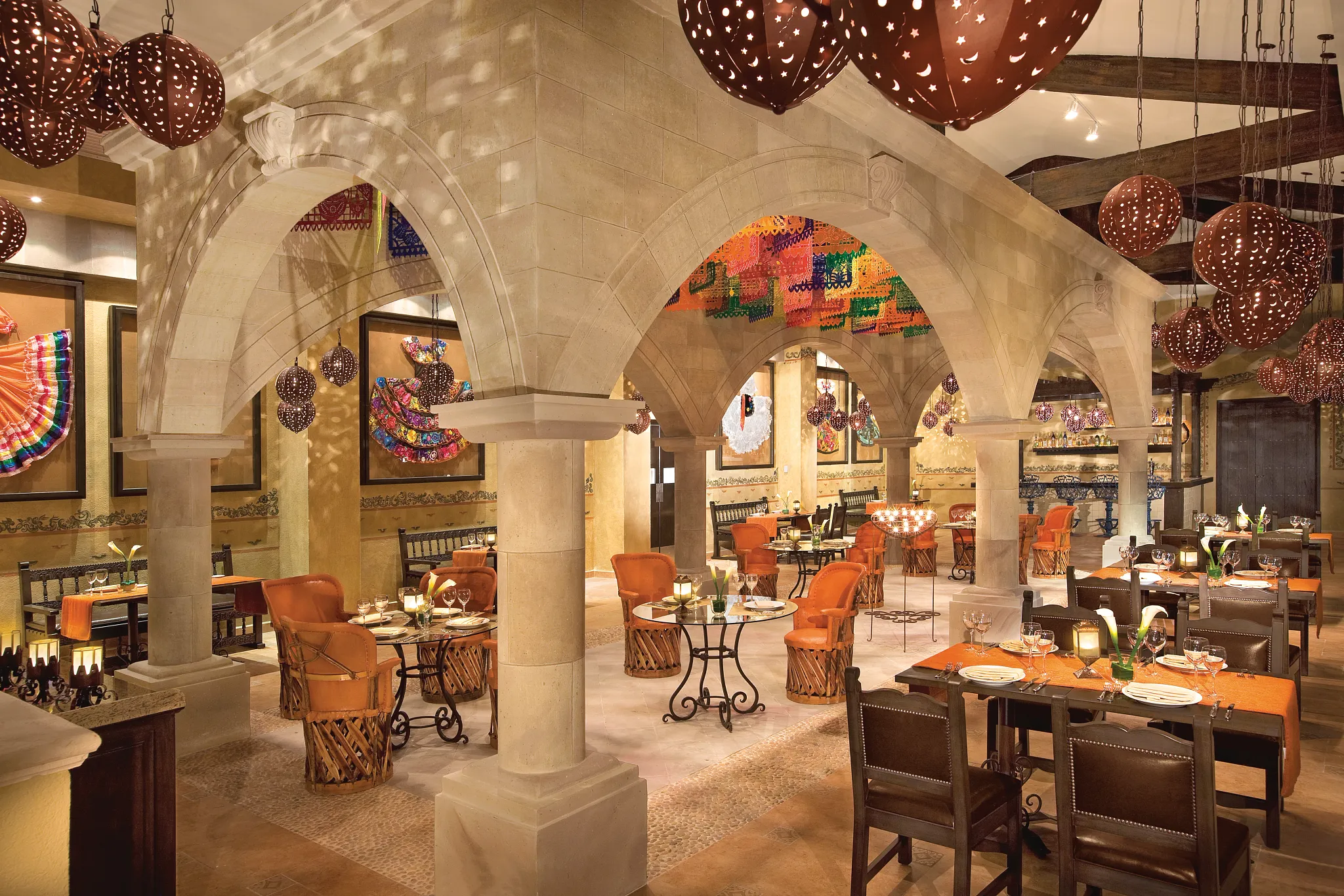 El Patio Mexican restaurant at Dreams Riviera Cancun Resort & Spa featuring colorful décor, traditional ambiance, and authentic Mexican cuisine.