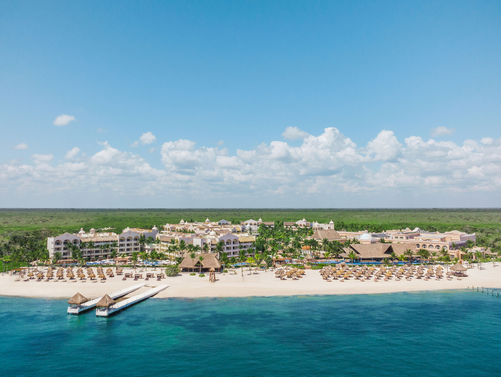 Excellence Riviera Cancun adults-only luxury all-inclusive resort with elegant pools, gourmet dining, and pristine beach in the Riviera Maya.