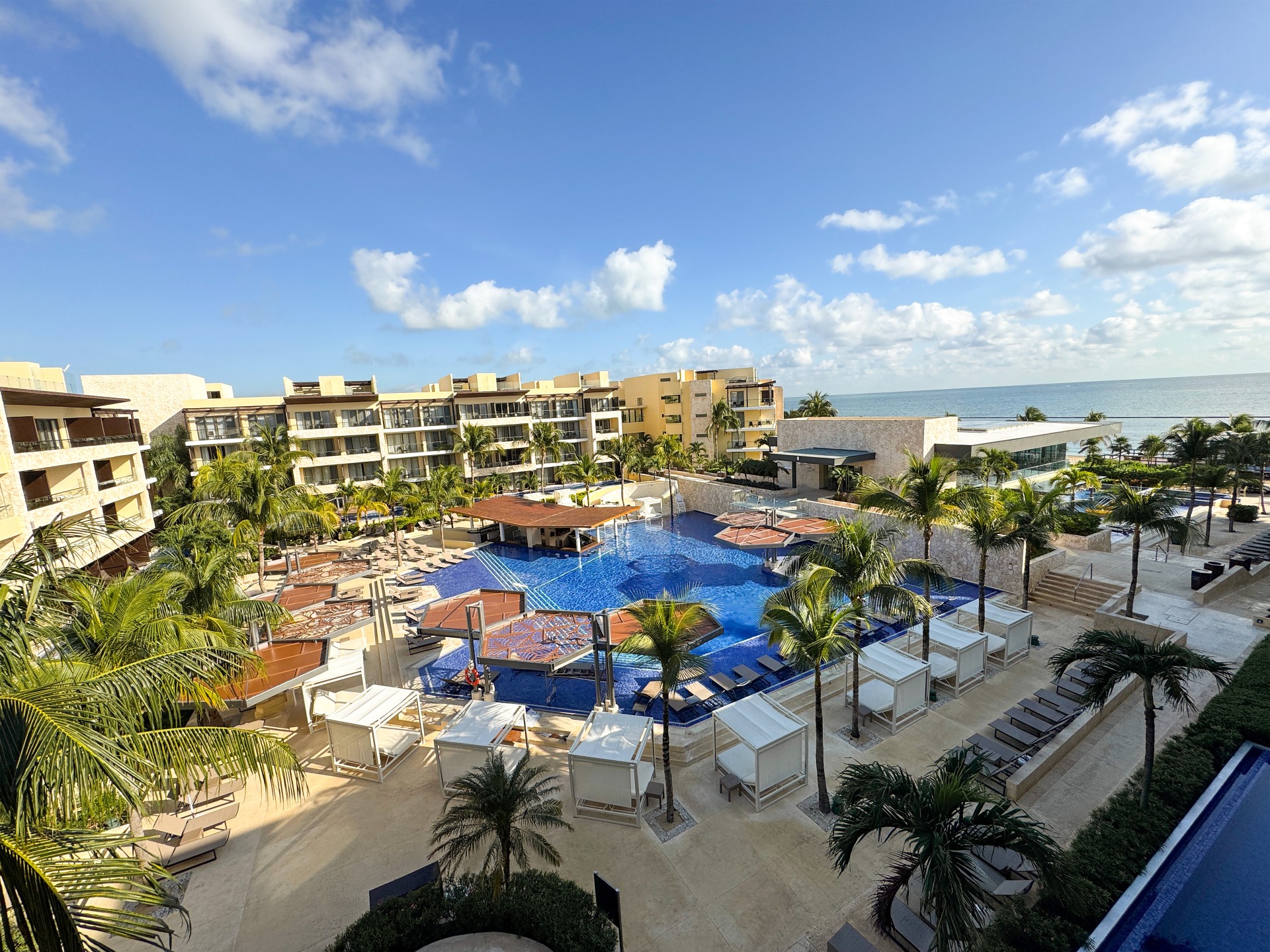 Hideaway at Royalton Riviera Cancun adults-only all-inclusive resort with infinity pools, modern suites, and beachfront luxury near Puerto Morelos.