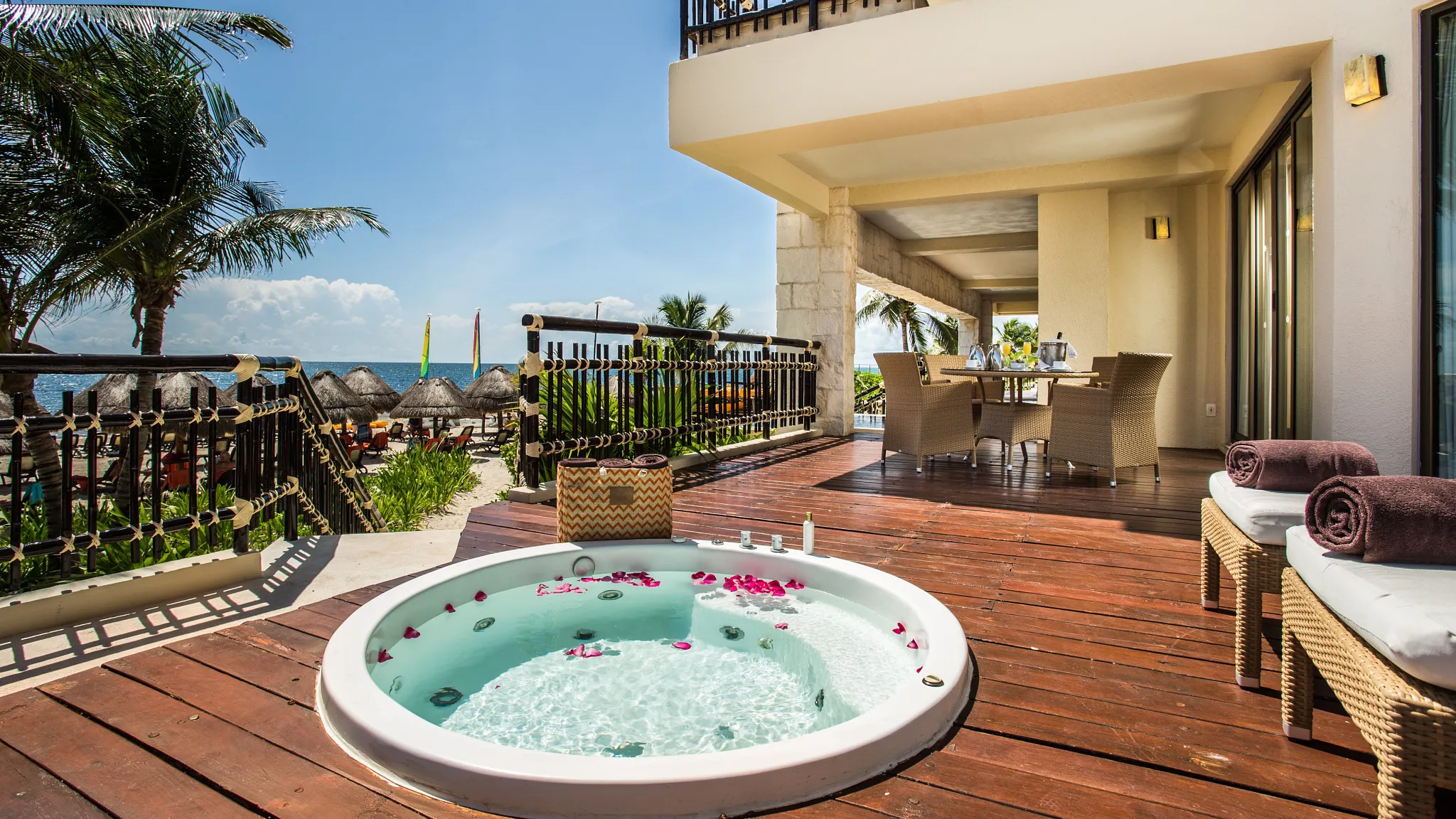 Preferred Club Ocean Front Presidential Suite private terrace with plunge pool and beach access at Dreams Riviera Cancun Resort & Spa.