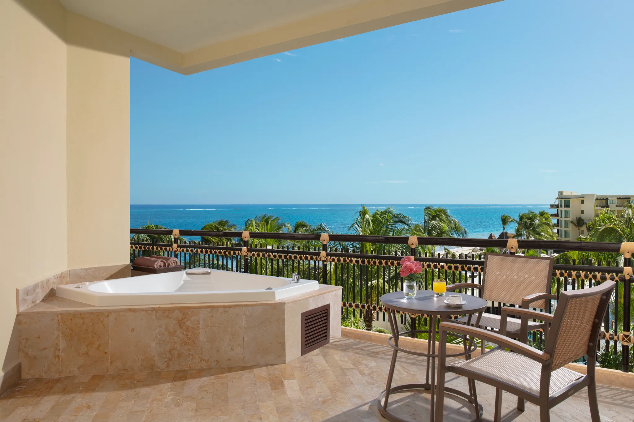 Preferred Club Ocean View terrace with outdoor hot tub and ocean views at Dreams Riviera Cancun.