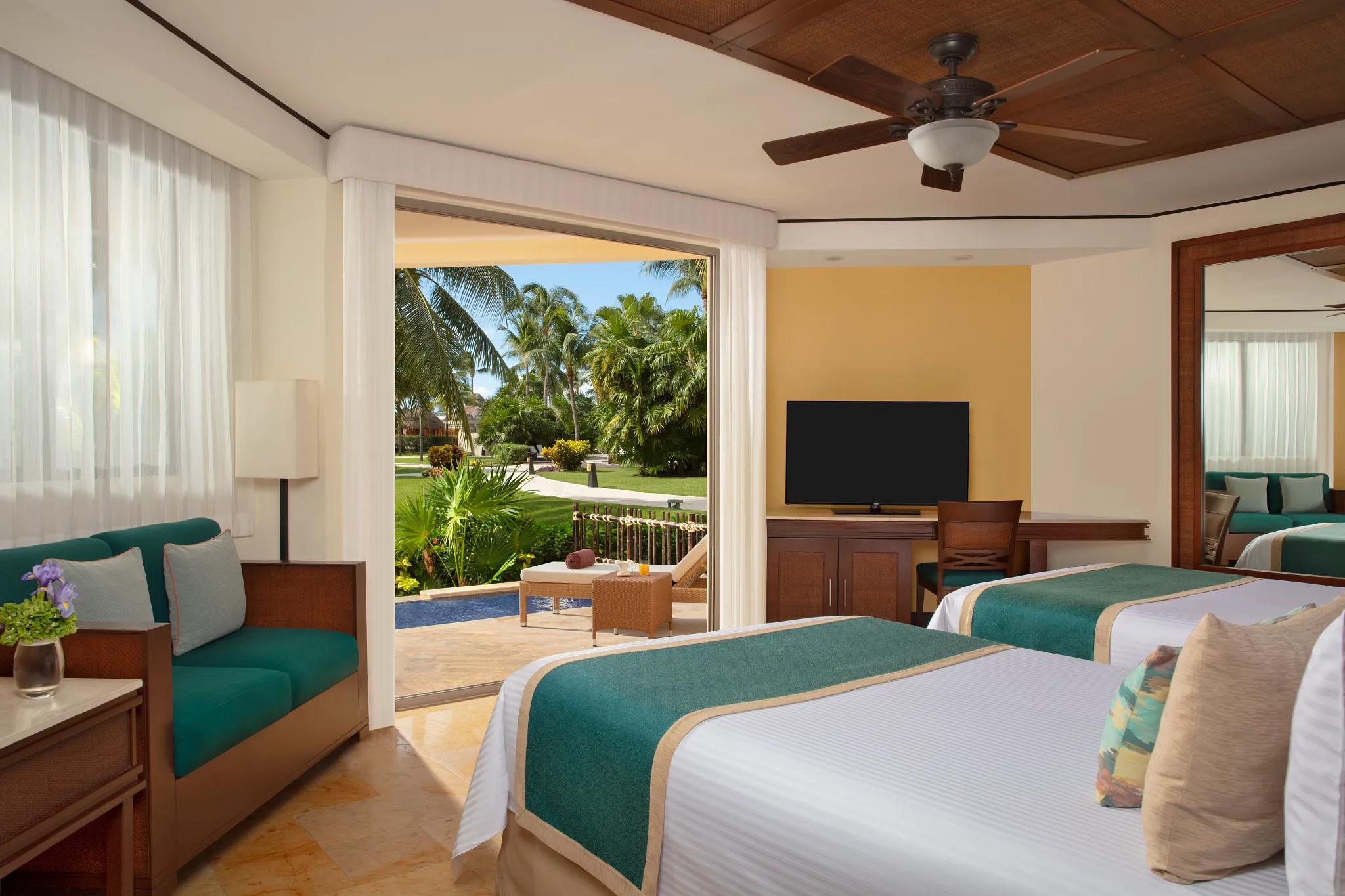 Preferred Club plunge pool terrace with two double beds room at Dreams Riviera Cancun