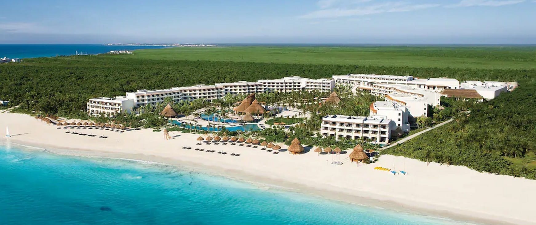 Secrets Maroma Beach Riviera Cancun adults-only luxury all-inclusive resort on Maroma Beach with pristine white sand and turquoise Caribbean waters.