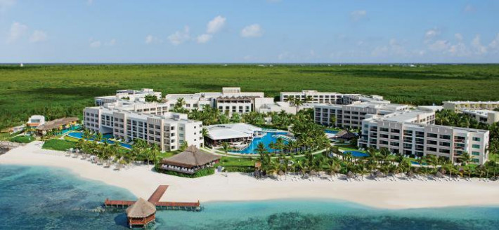 Secrets Silversands Riviera Cancun adults-only Unlimited-Luxury all-inclusive resort with modern architecture, infinity pools, and Caribbean beach.