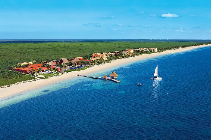 Zoetry Paraiso de la Bonita Riviera Maya luxury boutique resort with oceanfront suites, thatched-roof spa, and secluded beach in Puerto Morelos.